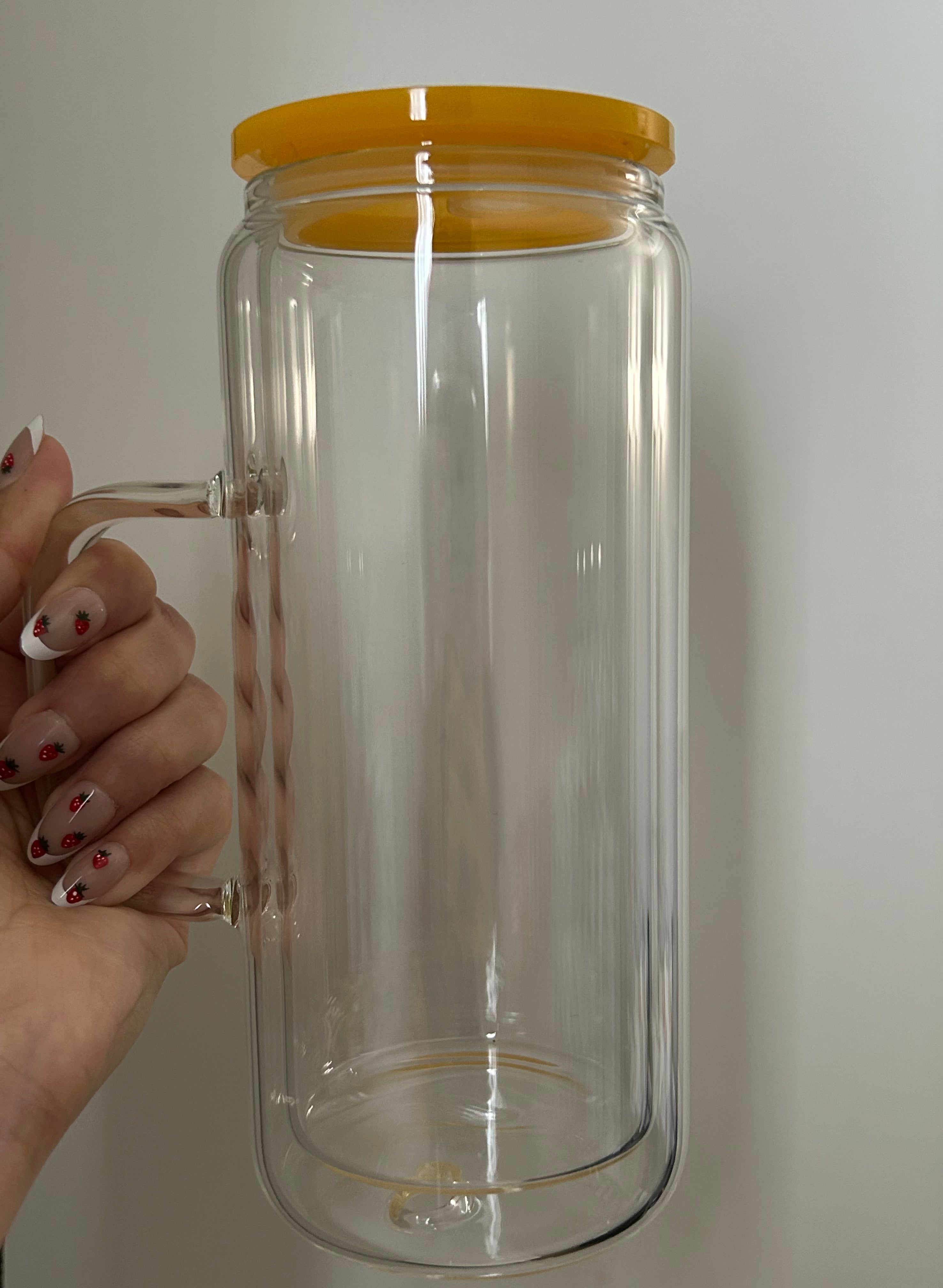 Yellow 20 oz glass handle with lid